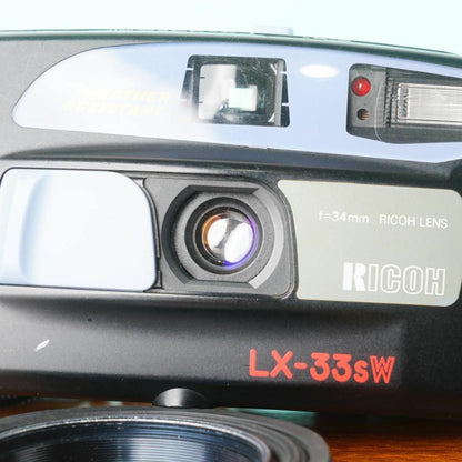 Ricoh LX-33sW 34mm F4.5 - Filem.sg