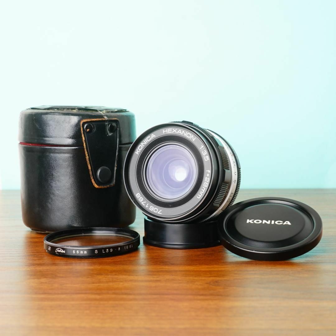 Konica Hexanon 28mm f3.5 AR with case - Filem.sg