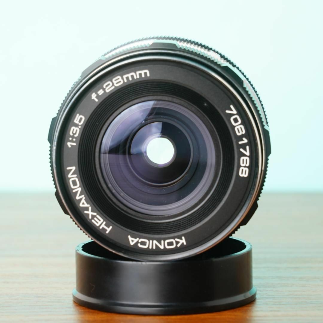 Konica Hexanon 28mm f3.5 AR with case - Filem.sg