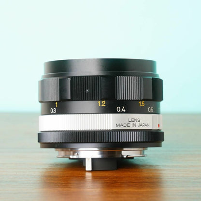 Konica Hexanon 28mm f3.5 AR with case - Filem.sg