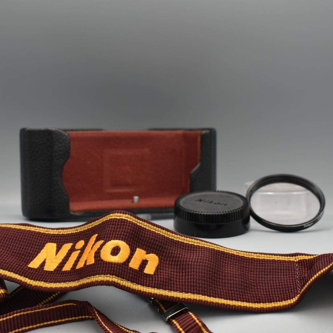 Nikon F2 Photomic 55mm f1.2 (Black) - Filem.sg