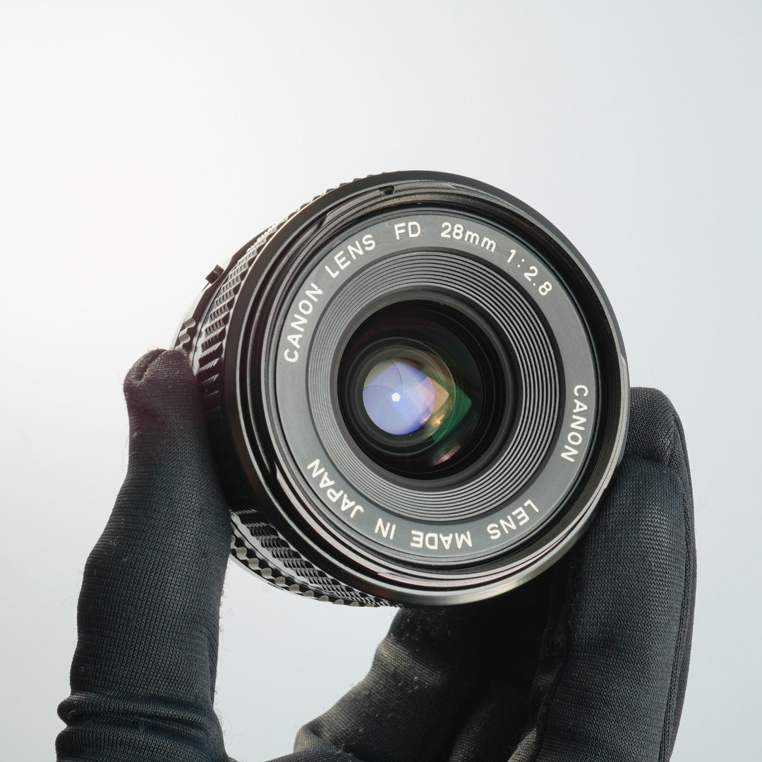 Canon New FD NFD 28mm f2.8 - Filem.sg
