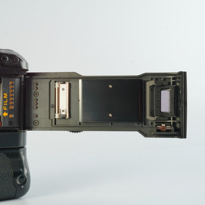 Canon EOS 1N + Power Drive Booster E1 - Filem.sg