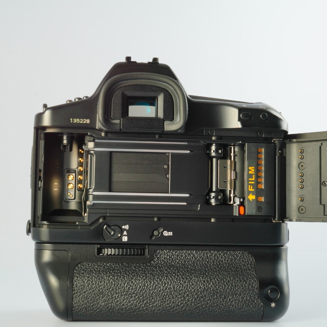 Canon EOS 1N + Power Drive Booster E1 - Filem.sg