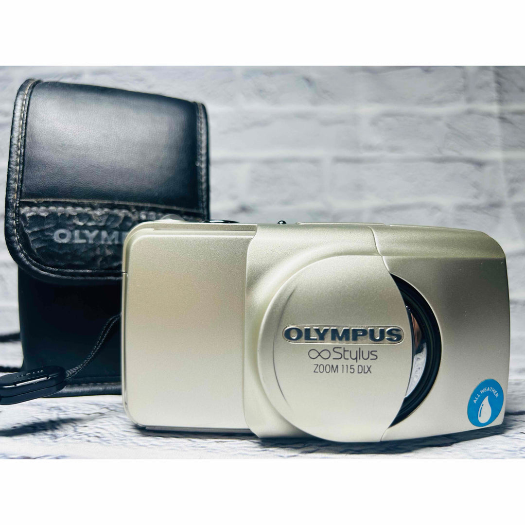 Olympus ∞ Stylus 115 DLX - Filem.sg