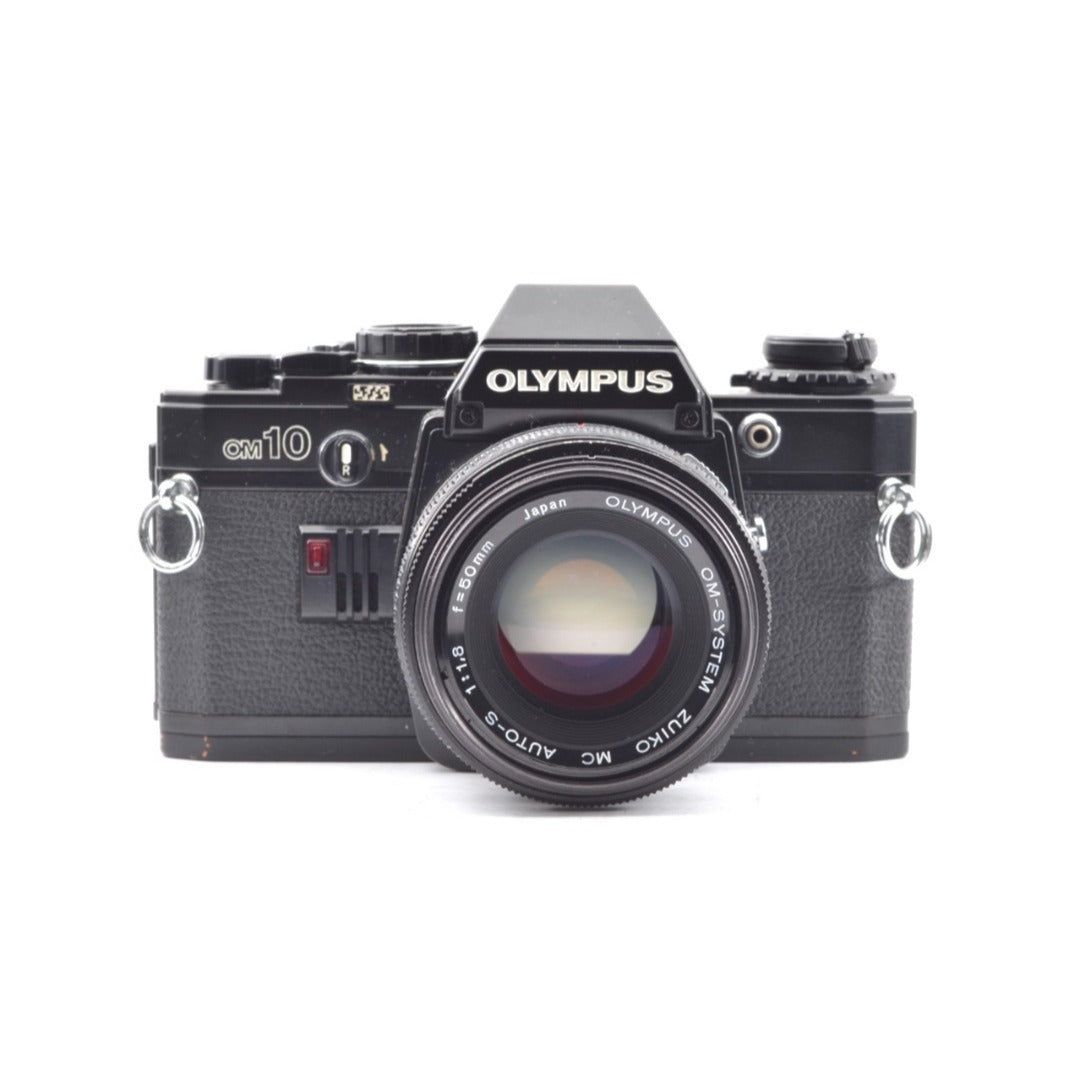 Olympus OM-10 with Zuiko MC 50mm f/1.8 - Filem.sg