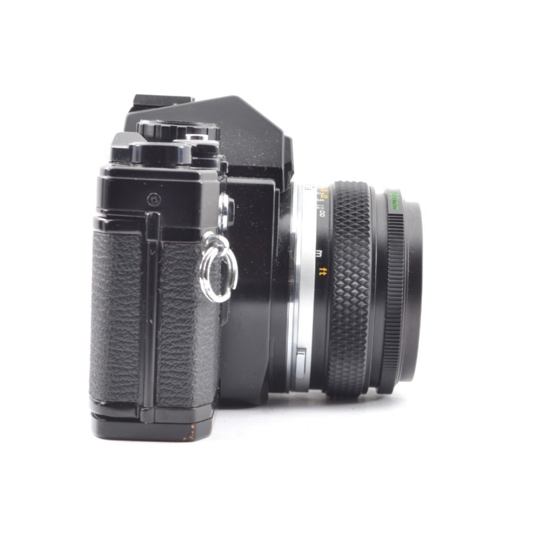 Olympus OM-10 with Zuiko MC 50mm f/1.8 - Filem.sg