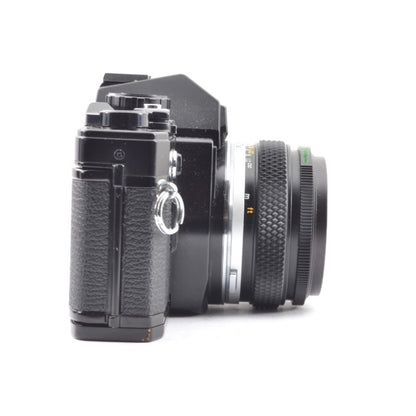 Olympus OM-10 with Zuiko MC 50mm f/1.8 - Filem.sg